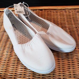 Slip-on flats. Size 9. White. NEW